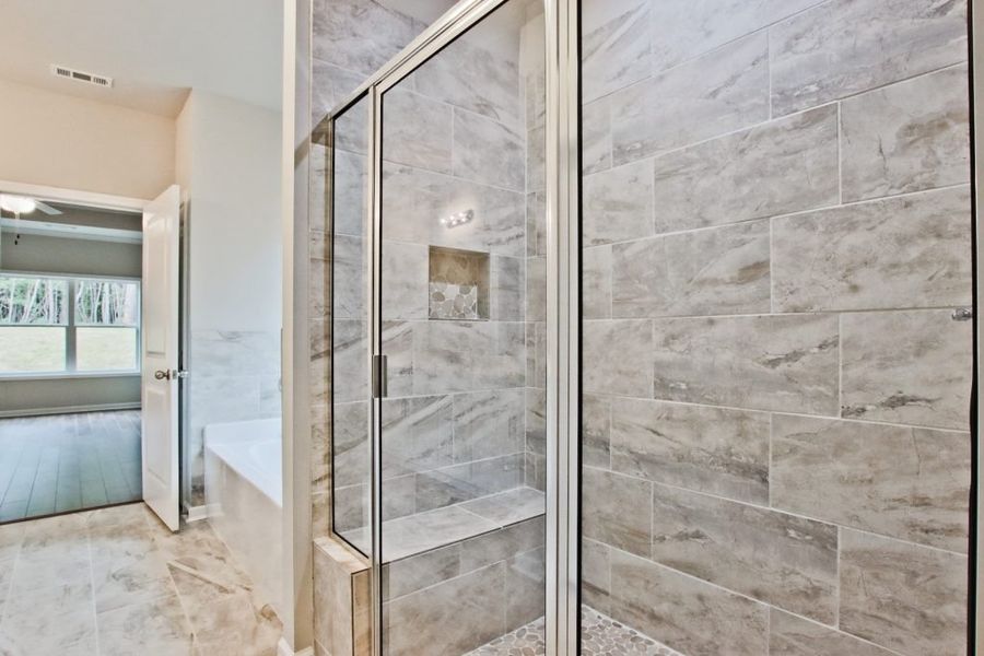 Furnished interior in a model home at Rockwell Farms in Winder (Image 6).