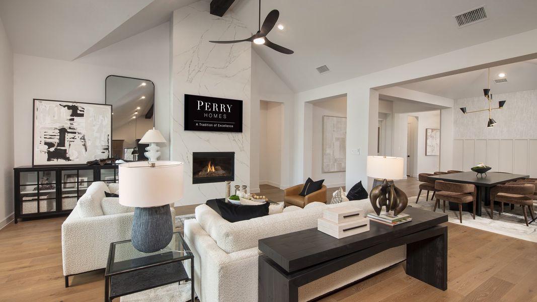 Furnished interior in a model home at Riceland 70' in Mont Belvieu (Image 5).