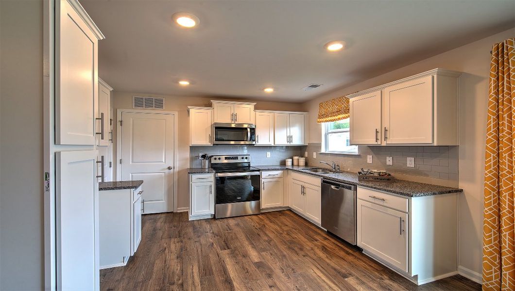 Furnished interior in a model home at Virginia Commons in Arden (Image 9).