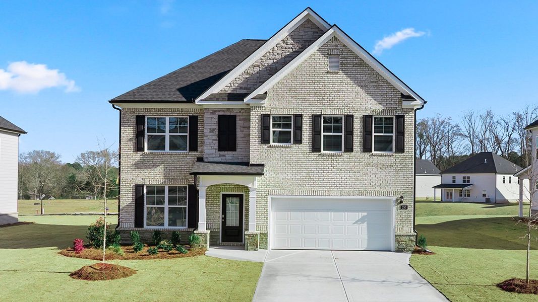 Front exterior of a home in the Independence community, located in Loganville, GA (Image 4).