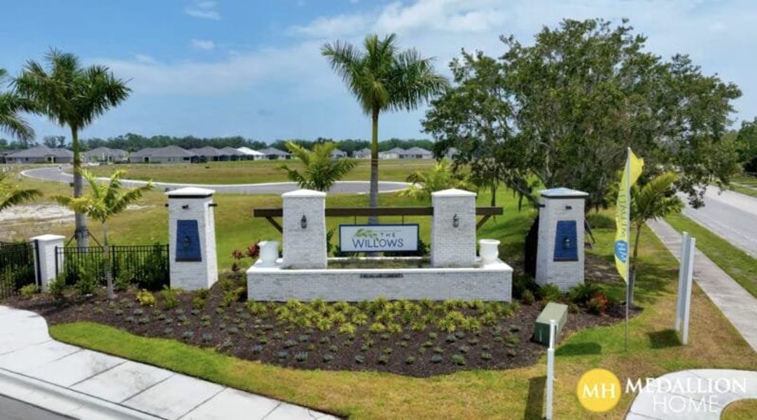 Entrance to the The Willows community in Parrish, FL, featuring signage and landscaping (Image 2).