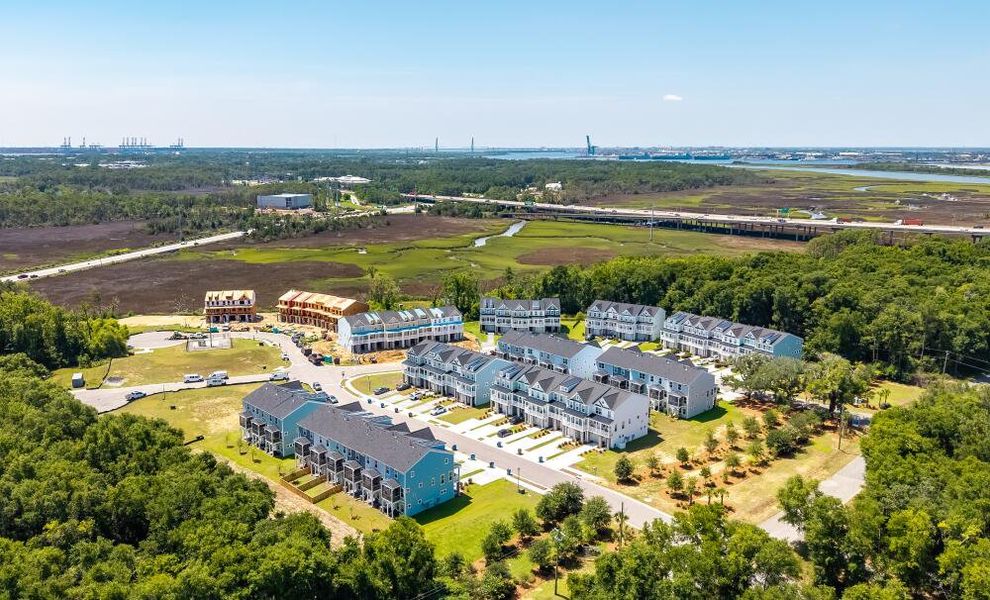 Aerial view of the The Bluffs at Pinefield Townhomes community in Charleston, SC, showing layout and nearby surroundings (Image 11).