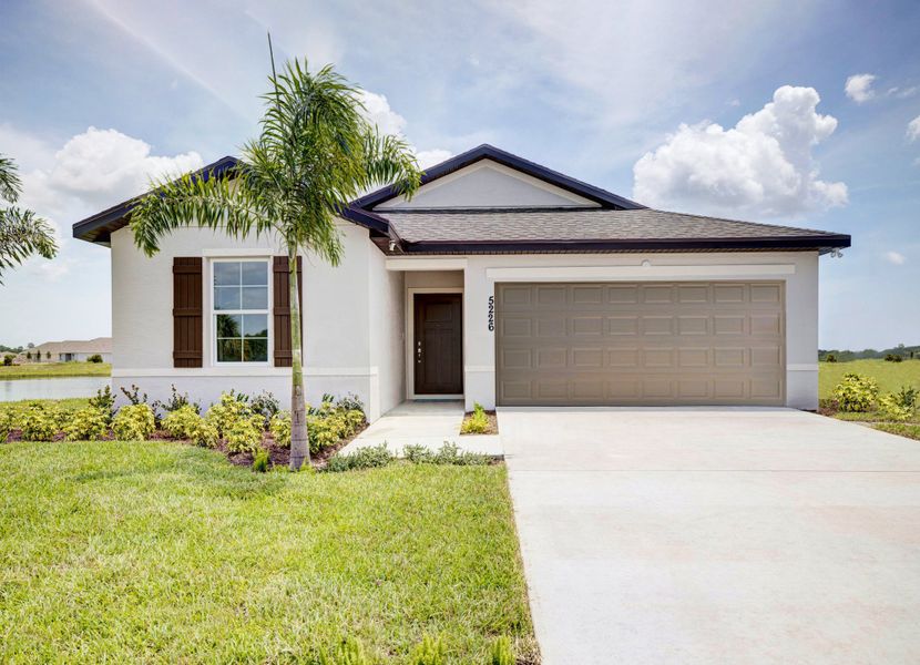 Front exterior of a home in the Aspire at Waterstone community, located in Fort Pierce, FL (Image 3).