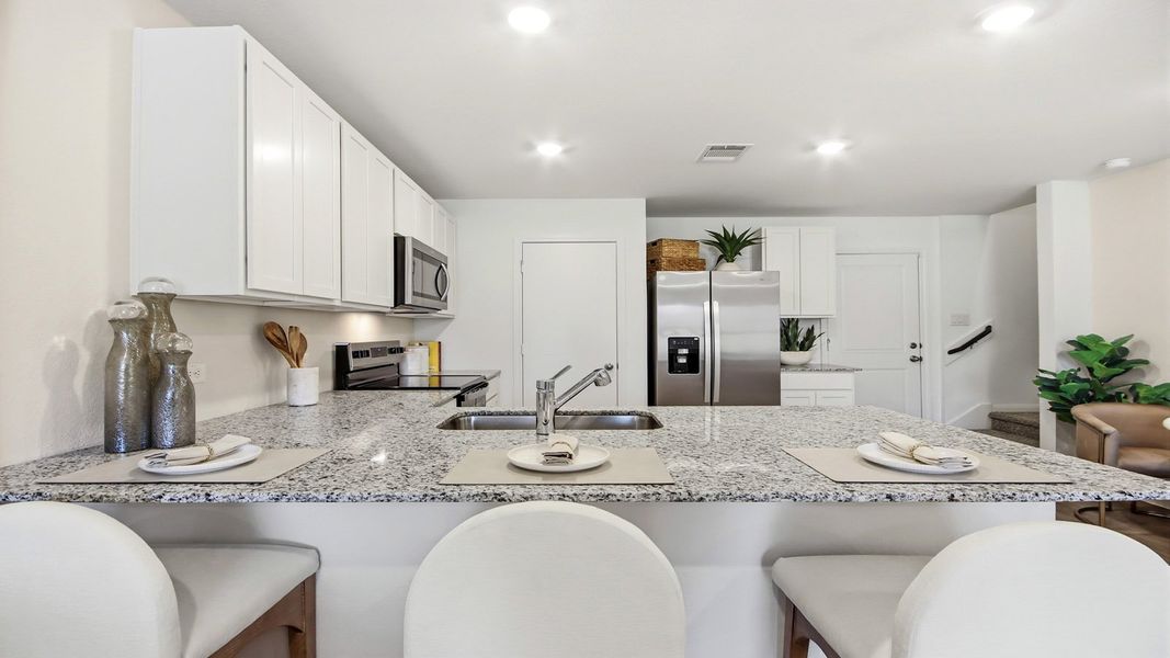 Furnished interior in a model home at Gemini in Splendora (Image 7).