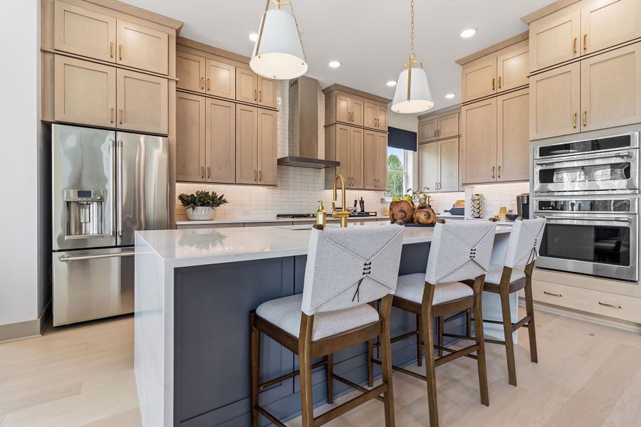 Furnished interior in a model home at Meadow Brook Farms in Cumming (Image 9).