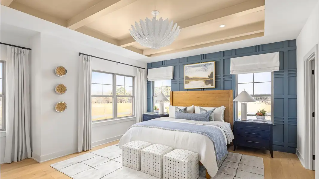 Lavish primary bedrooms feature large walk-in closets and spa-like baths