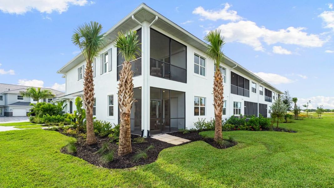 Front exterior of a home in the Esplanade by the Islands Coach Homes community, located in Naples, FL (Image 23).