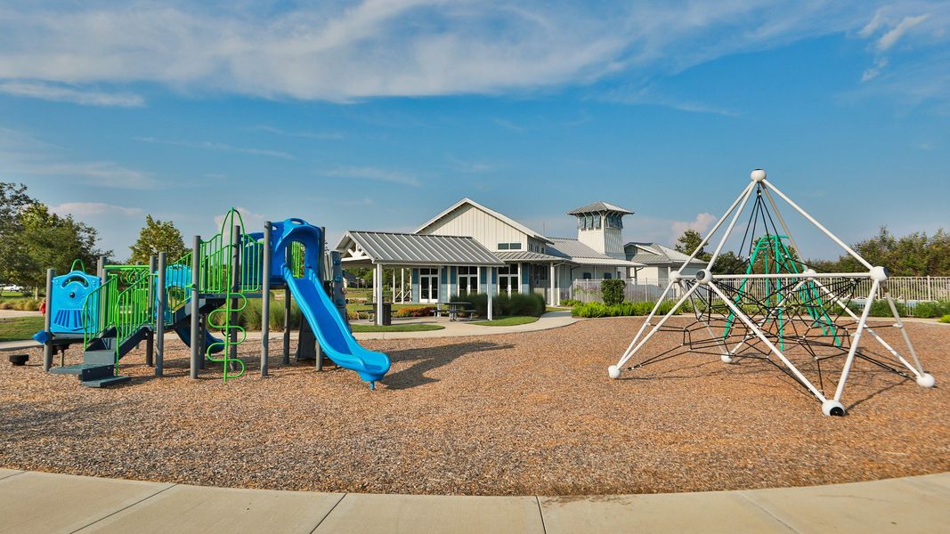 Modern clubhouse and vibrant playground in League City’s Coastal Point community.