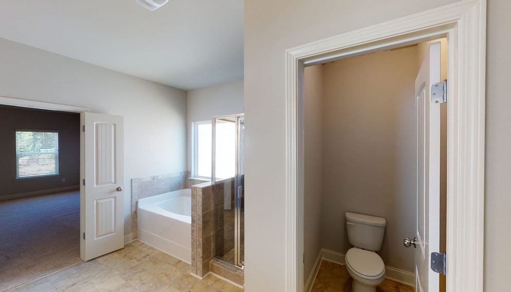 Furnished interior in a model home at Cove Lake Estates in Conley (Image 26).