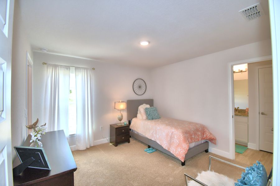 Furnished interior in a model home at Citrus Landing in Davenport (Image 36).