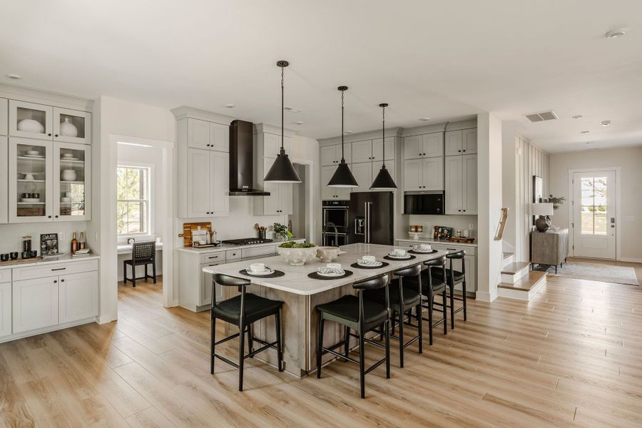Furnished interior in a model home at Mayes Hall in Davidson (Image 43).