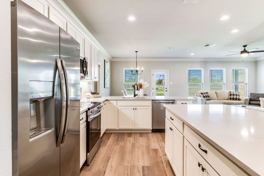Furnished interior in a model home at Eagle Pointe in Pensacola (Image 3).