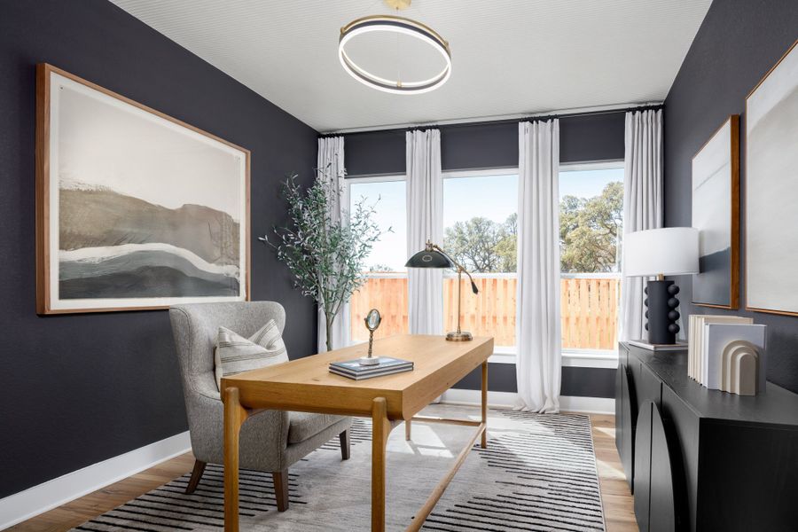 Furnished interior in a model home at Parmer Ranch in Georgetown (Image 44).