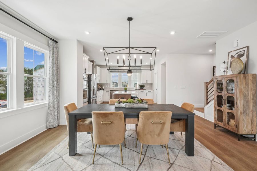 Furnished interior in a model home at Mews at Holding Village in Wake Forest (Image 49).