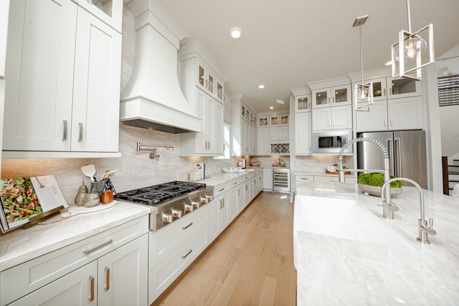 Furnished interior in a model home at ARTAVIA in Conroe (Image 11).