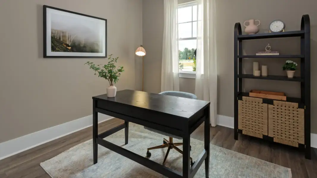 Furnished interior in a model home at The Retreat at Indigo Preserve Townhomes in Leland (Image 32).