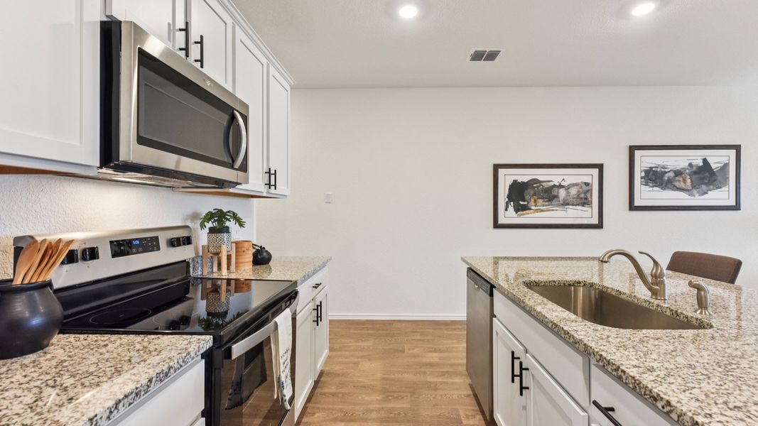 Furnished interior in a model home at Palomino in Manor (Image 23).