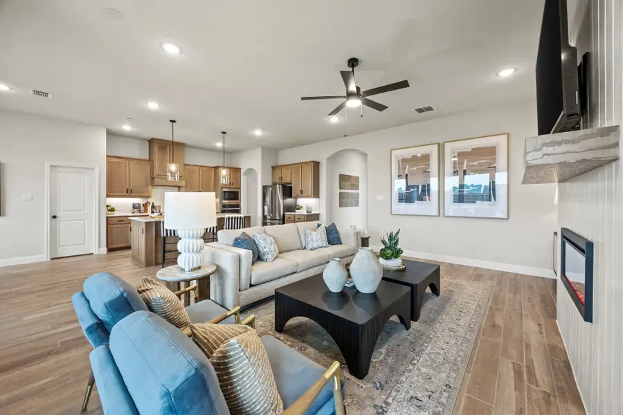 Furnished interior in a model home at Mockingbird Hills - Signature Series in Joshua (Image 9).