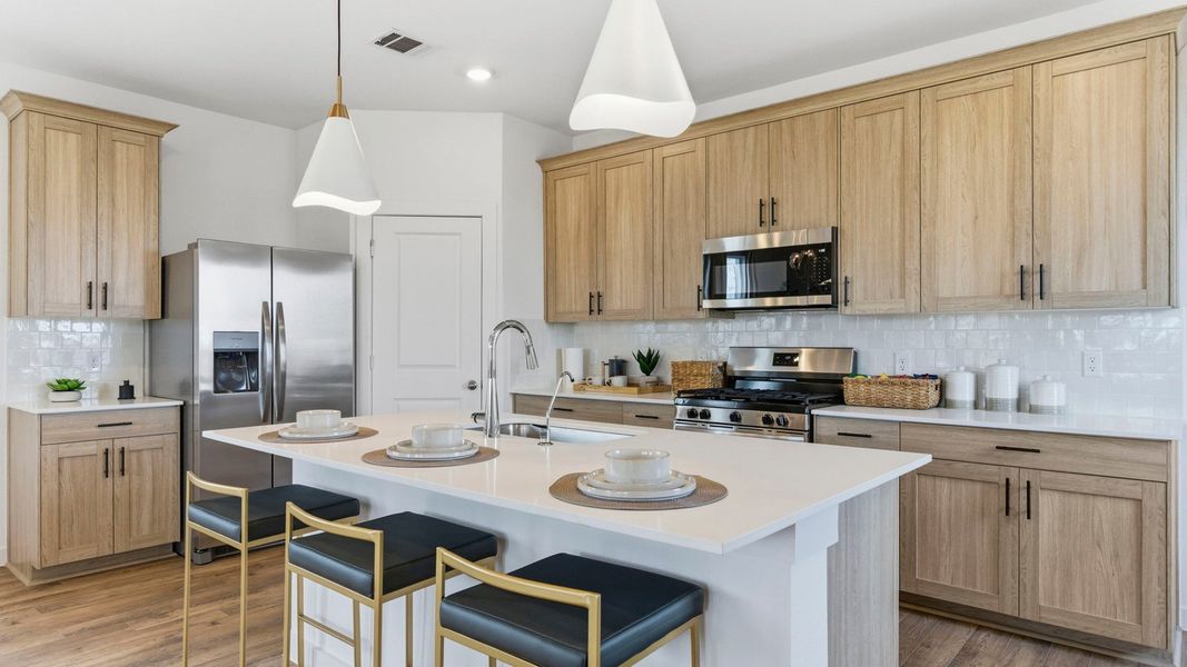 Furnished interior in a model home at Murphy Village in Missouri City (Image 4).