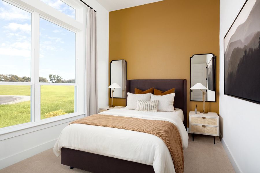 Furnished interior in a model home at Parmer Ranch in Georgetown (Image 39).