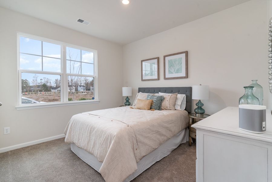 Furnished interior in a model home at Kingston Bay in Conway (Image 13).