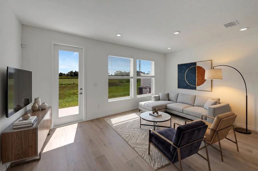 Furnished interior in a model home at North River Ranch – Townhomes in Parrish (Image 5).