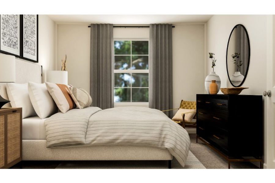 A bedroom with a bed and a mirror.