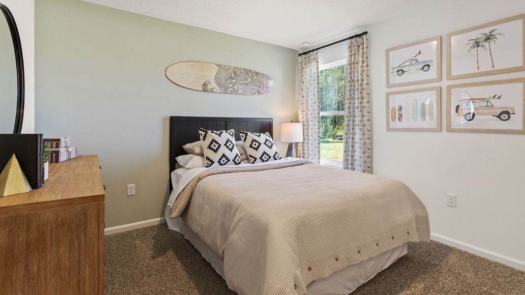 Furnished interior in a model home at Copes Landing in Jacksonville (Image 59).