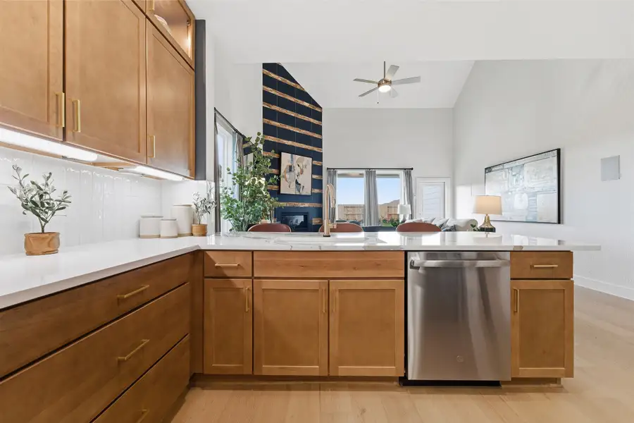 Furnished interior in a model home at Wildrye in Waller (Image 31).