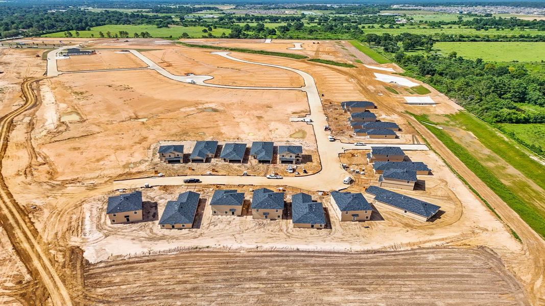 Aerial view of the Sunset Valley community in Hockley, TX, showing layout and nearby surroundings (Image 9).