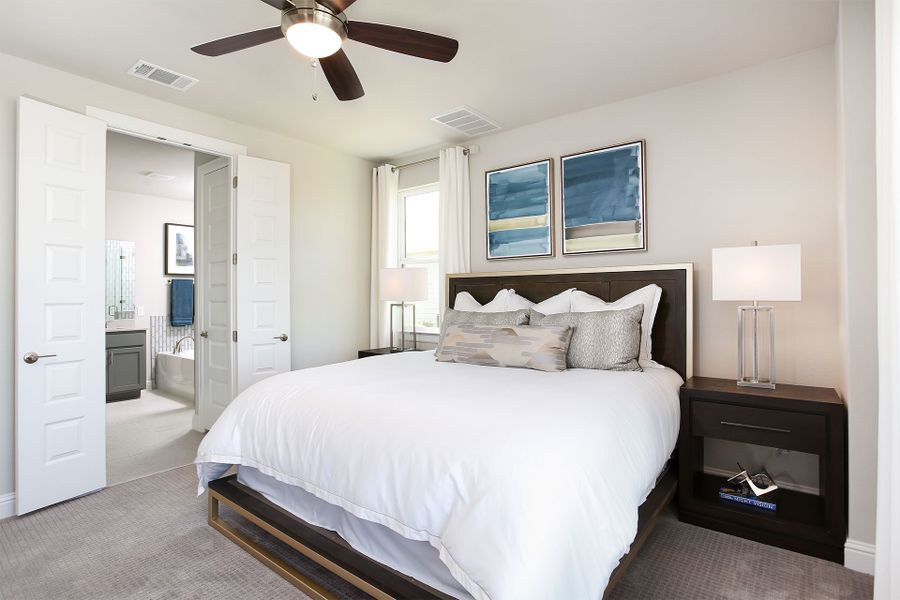 Furnished interior in a model home at Harvest Ridge in Elgin (Image 10).