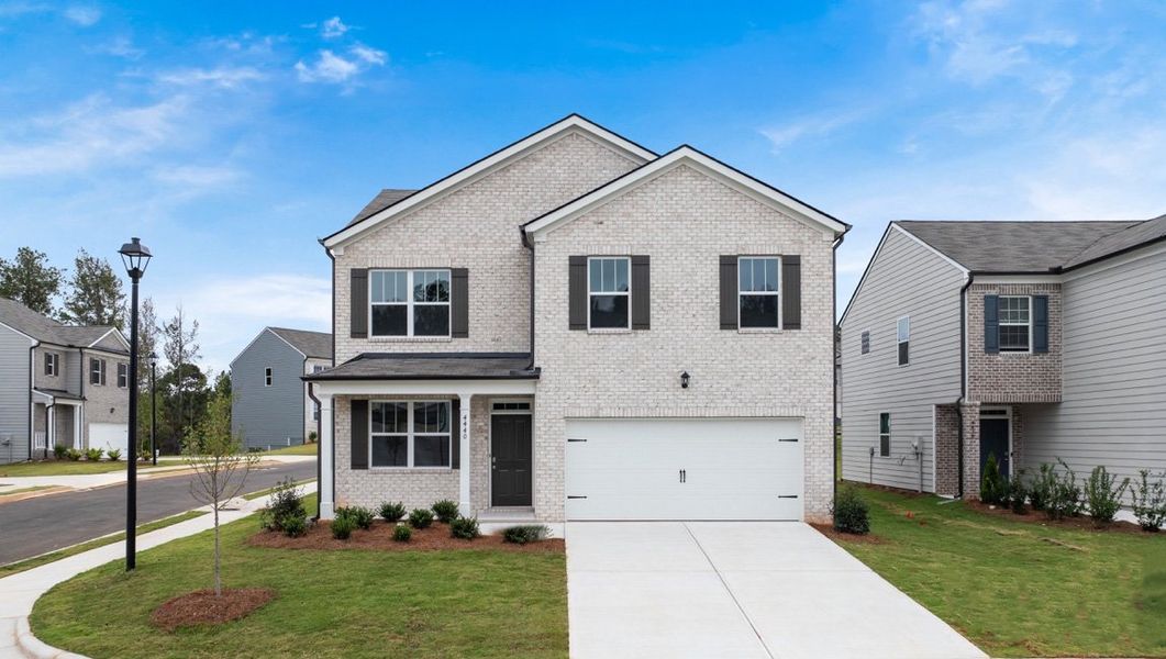 Front exterior of a home in the Pointe Park community, located in Union City, GA (Image 4). Front exterior of a home in the Pointe Park community, located in Union City, GA (Image 4).