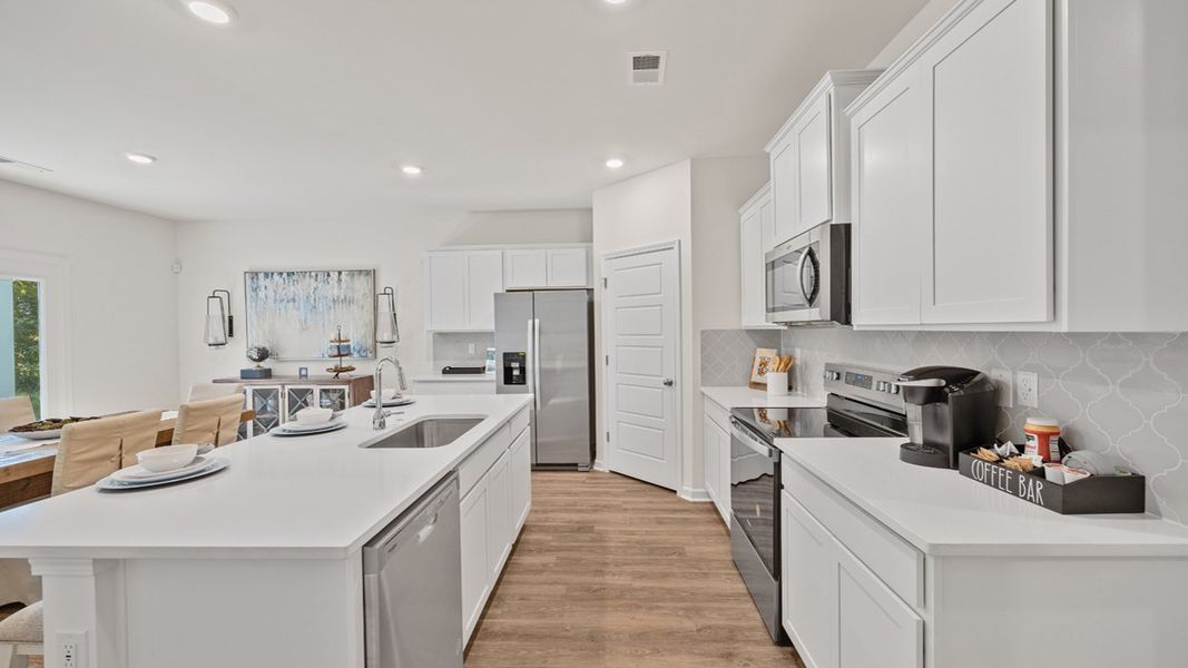 Furnished interior in a model home at Cottages at Blue Ridge in Bonaire (Image 13).