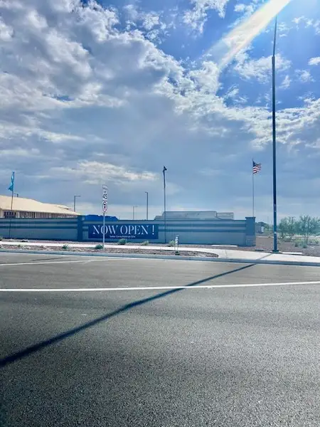 Discover Monroe Ranch by K. Hovnanian® Homes in Buckeye, AZ, featuring a contemporary community entrance.