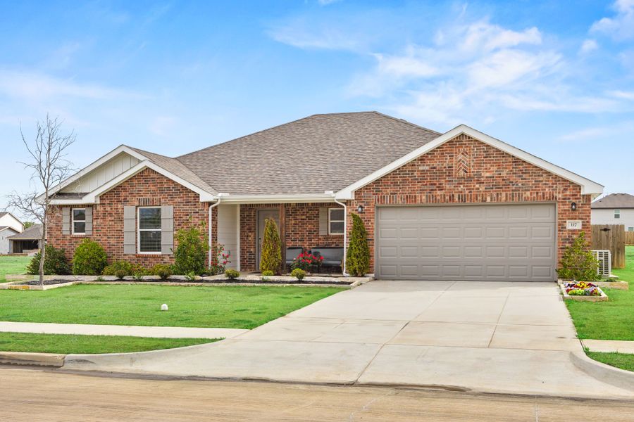 A house with a garage. A house with a garage.