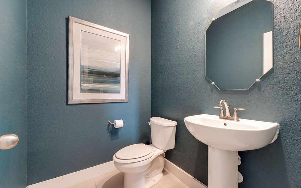 Furnished interior in a model home at Hunter's Ranch in San Antonio (Image 38).