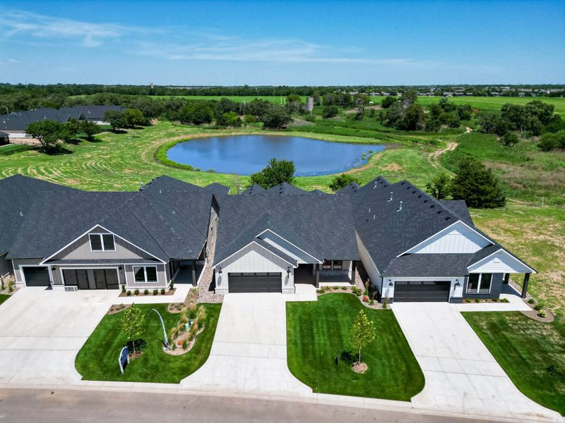 Front exterior of a home in the The Courtyards at Jacobs Farm community, located in Wichita, KS (Image 4). Front exterior of a home in the The Courtyards at Jacobs Farm community, located in Wichita, KS (Image 4).