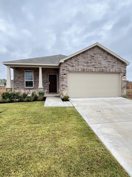 A charming brick home with a manicured lawn and spacious driveway in Ashford Crossing by Centex (Princeton, TX). A charming brick home with a manicured lawn and spacious driveway in Ashford Crossing by Centex (Princeton, TX).