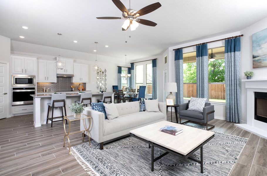 Family Room & Kitchen | Concept 2267 at Massey Meadows in Midlothian, TX by Landsea Homes