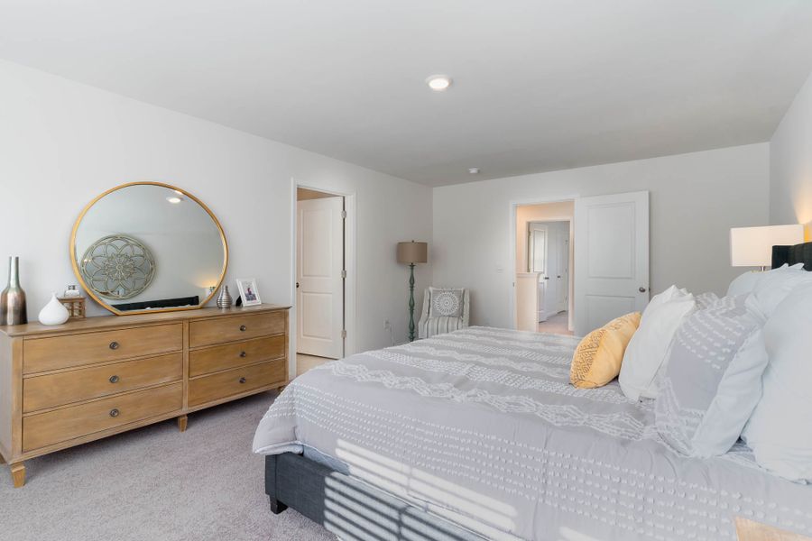 Furnished interior in a model home at Island Green in Myrtle Beach (Image 38).