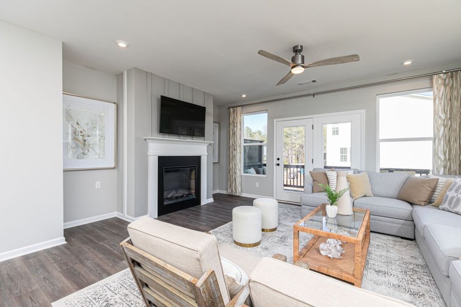 Large family rooms with a fireplace create a space for calm and cozy nights