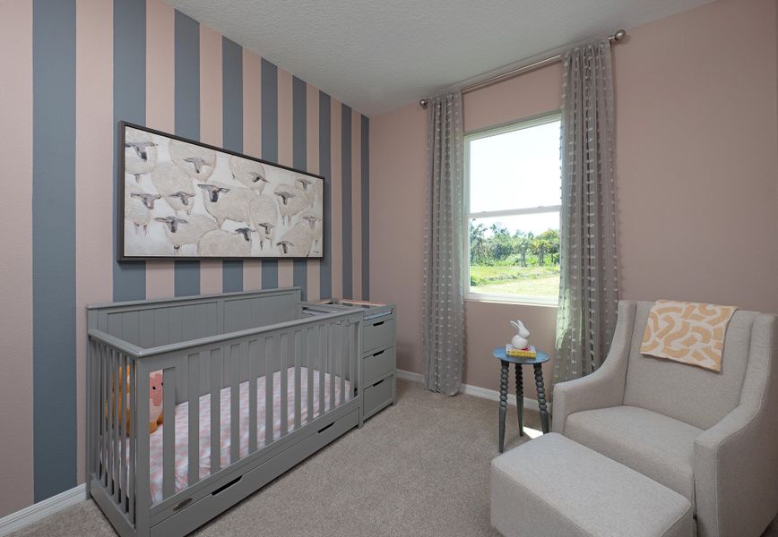 Furnished interior in a model home at Oakfield Trails Traditional in Parrish (Image 5).