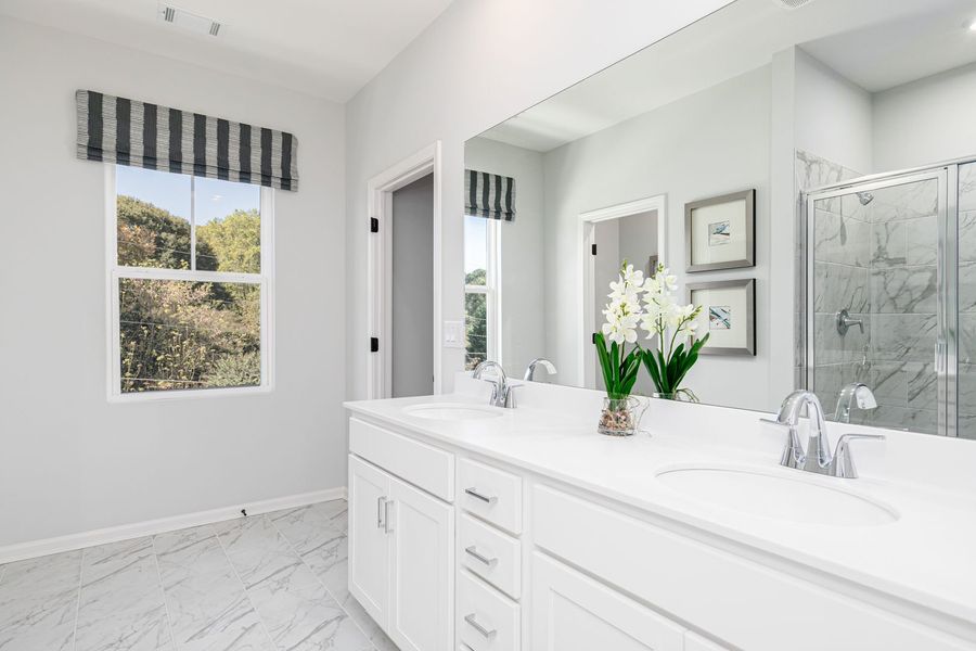 Primary bathroom featuring style and functionality for your daily routine
