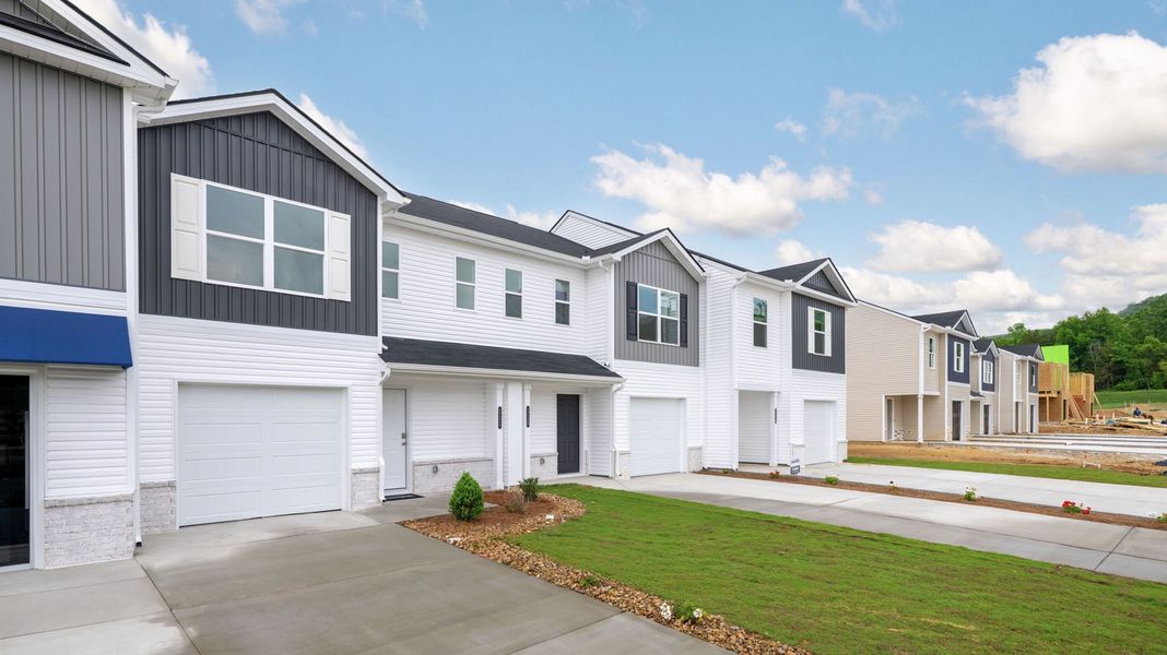 Front exterior of a home in the Owensby Farms Townhomes community, located in Dayton, TN (Image 6).
