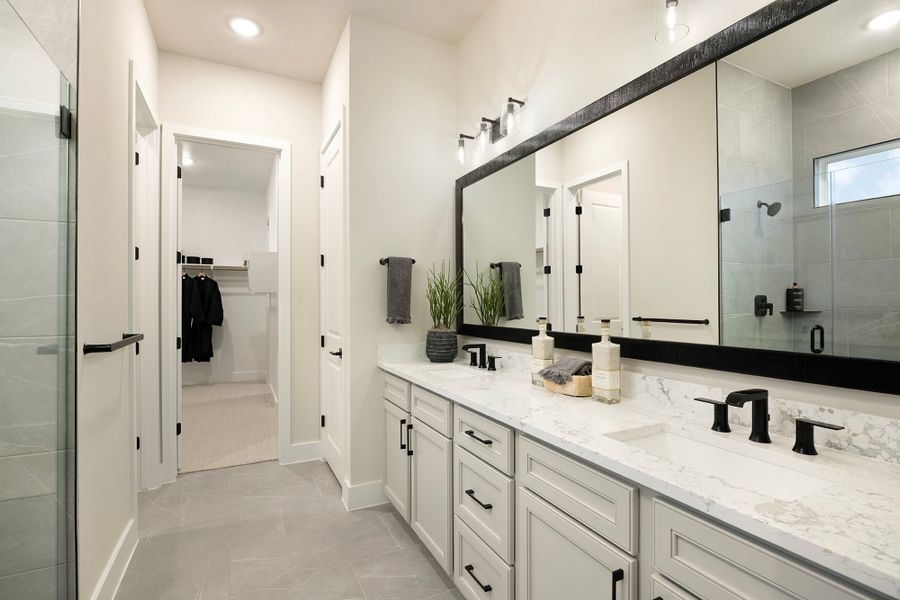 Furnished interior in a model home at Freedom at Anthem in Kyle (Image 26).