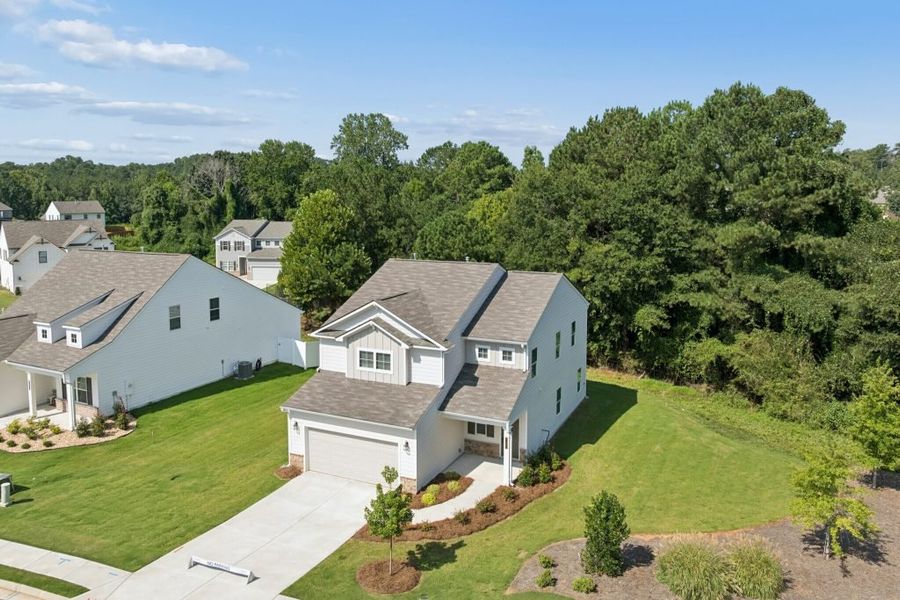 Front exterior of a home in the The Reserve at Chapel Hill Phase II community, located in Douglasville, GA (Image 12).