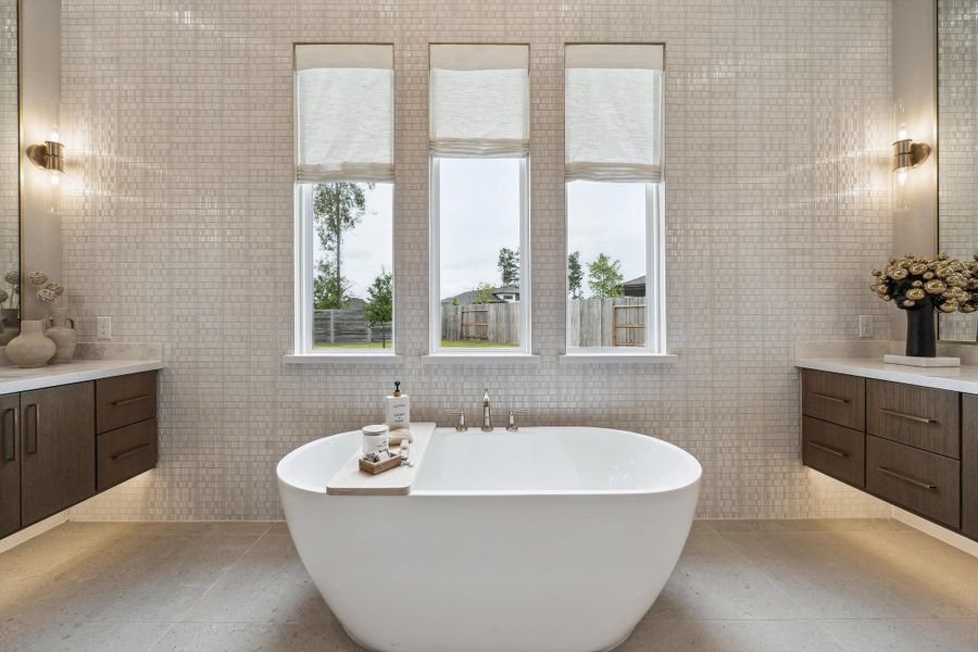 Furnished interior in a model home at ARTAVIA® - 65' Art Collection in Conroe (Image 17).