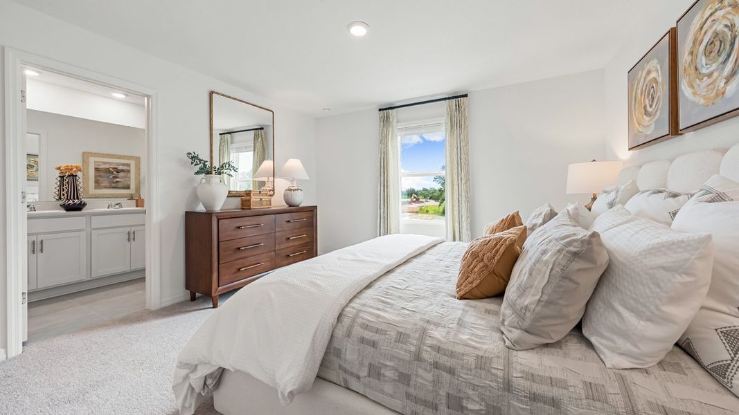 Furnished interior in a model home at The Towns at Skye Ranch in Sarasota (Image 42).