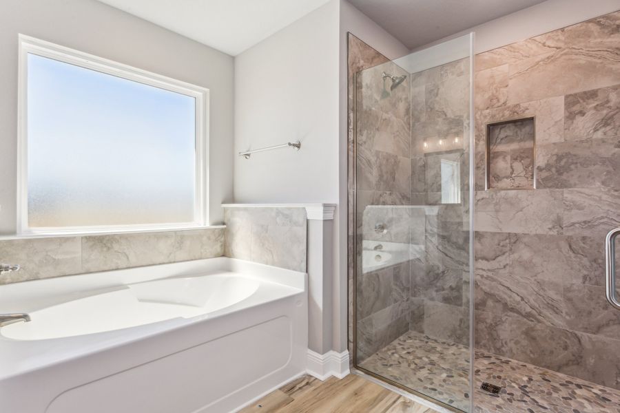 Furnished interior in a model home at Clear Water Landing in Milton (Image 7).