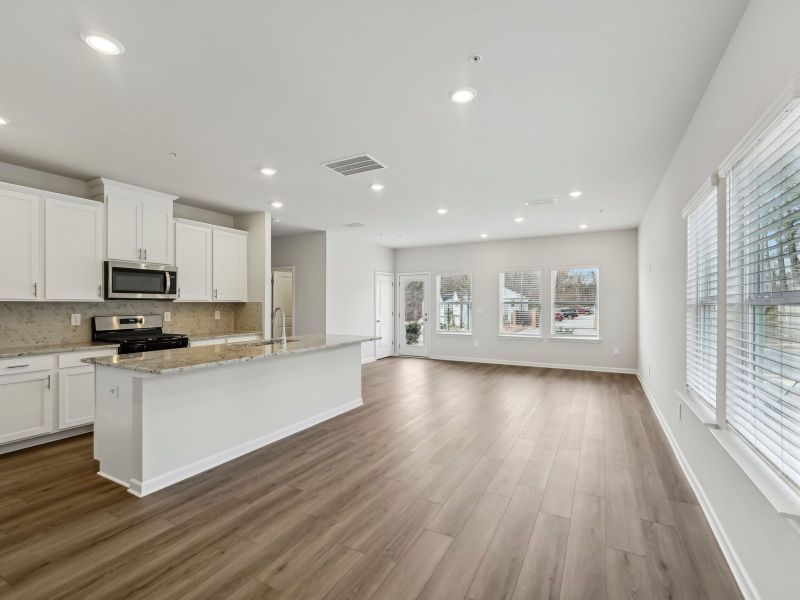 Furnished interior in a model home at Brooks Lake in Loganville (Image 4).